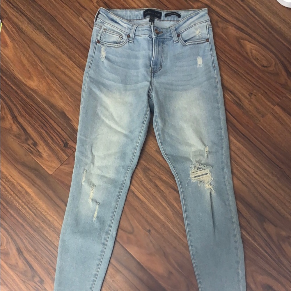 Kendall and Kylie light washed skinny jeans